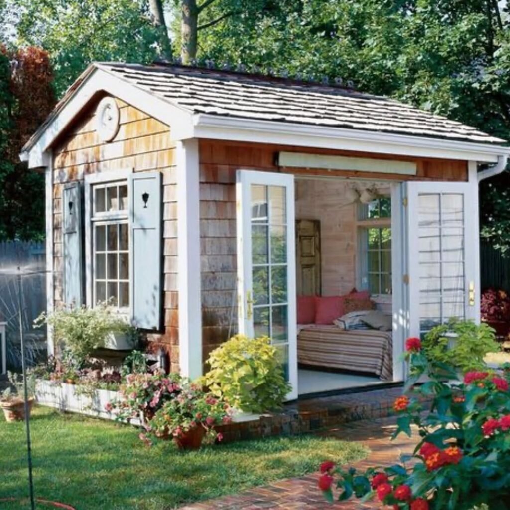 a cozy garden she shed space. from @countrylivingmag .....#mylavenderroselife #sheshed #gardenho