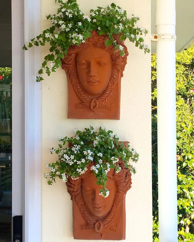white flower plant pot wall decor