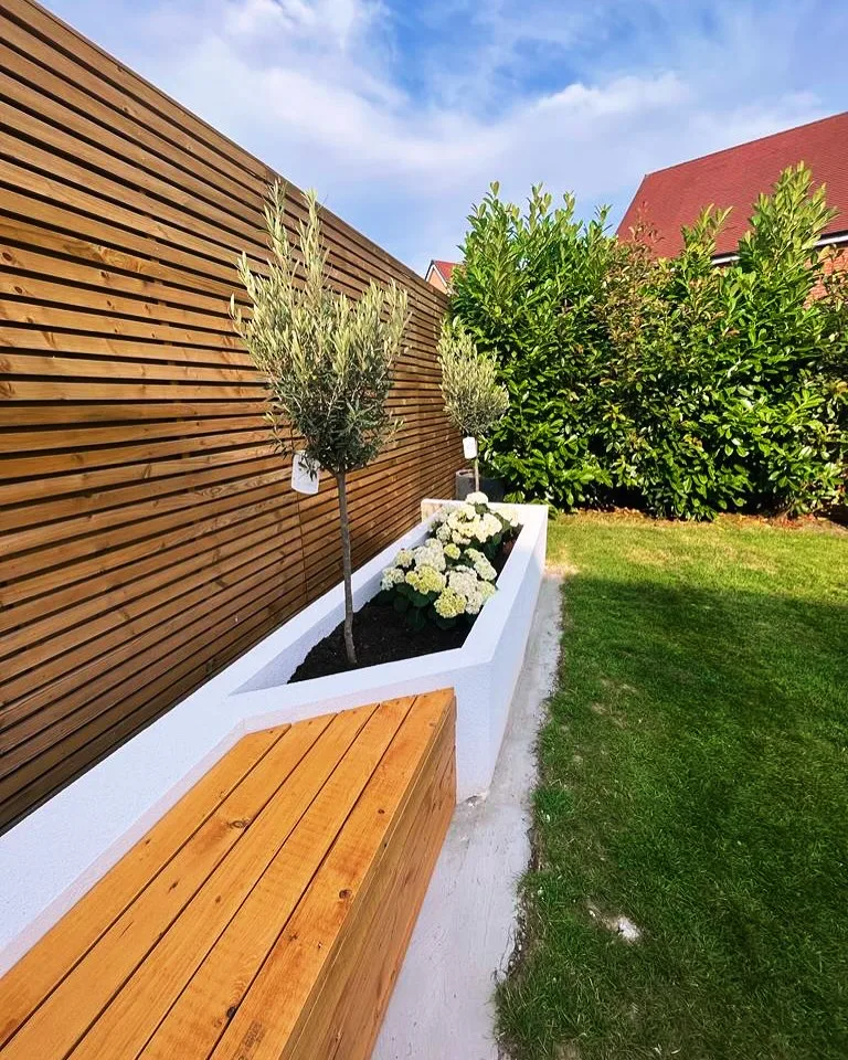 white hydrangea fence plant