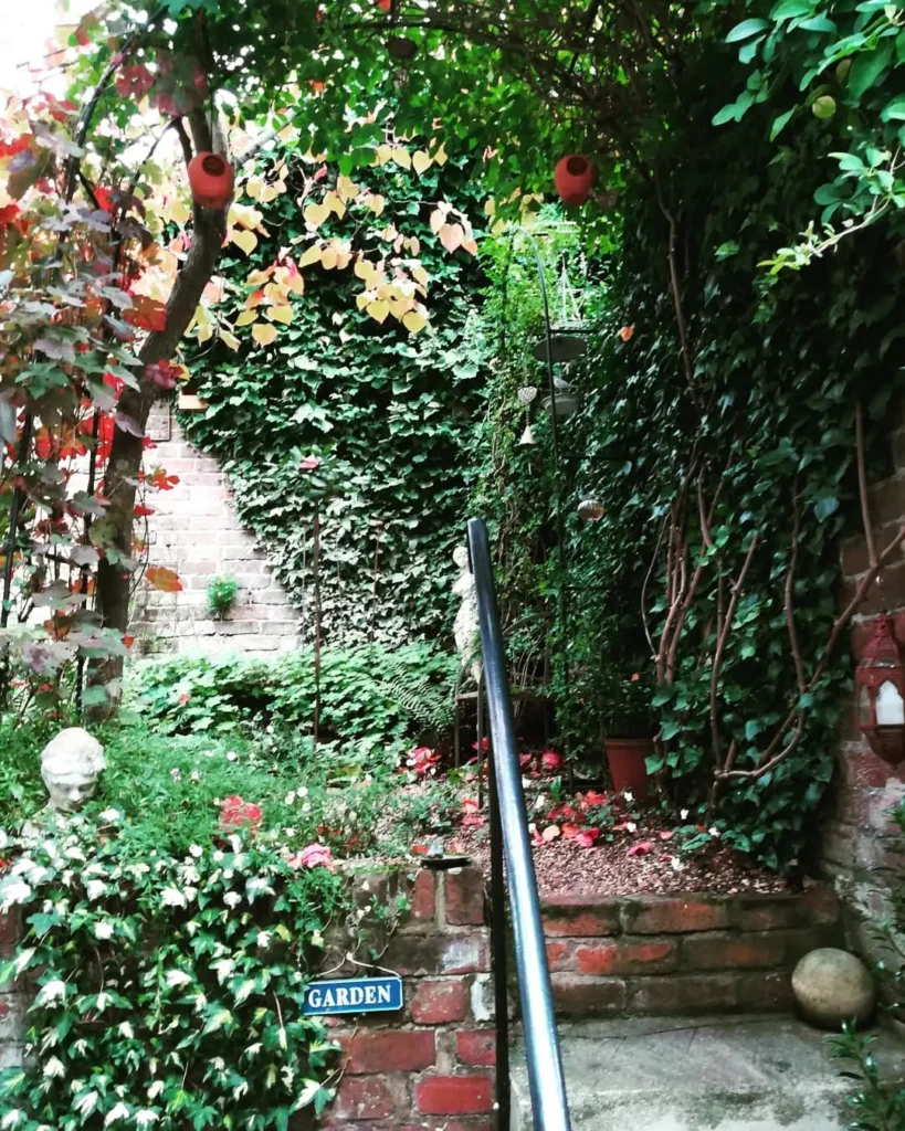 brickwork and lush greenery garden