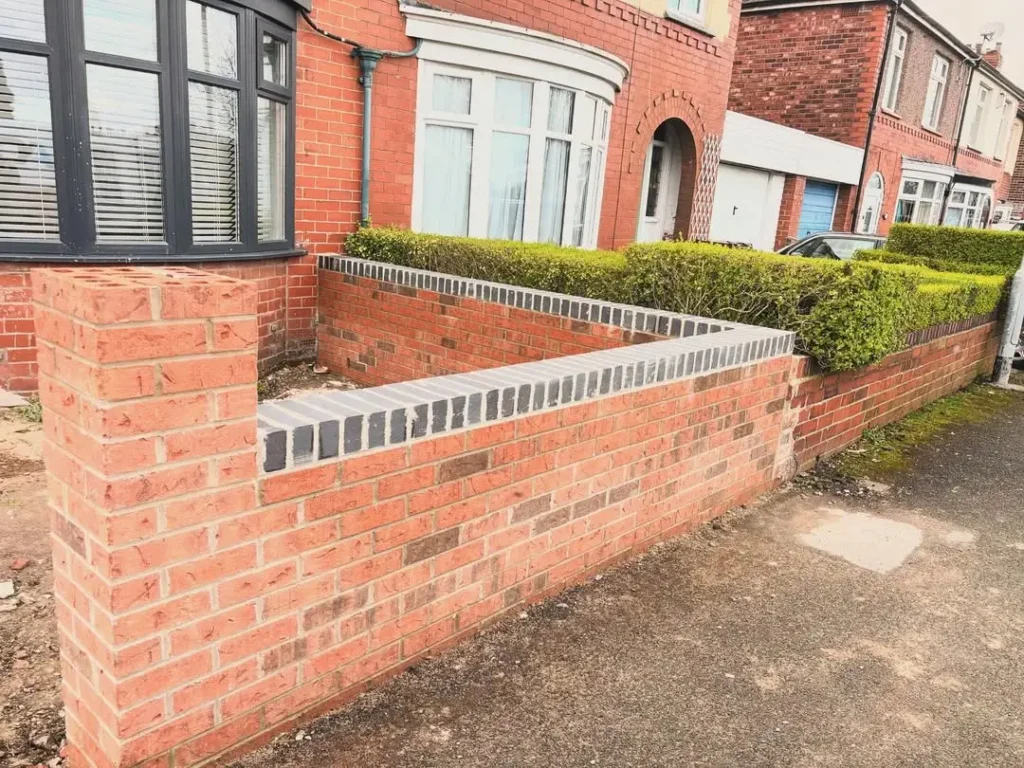 front brick wall garden