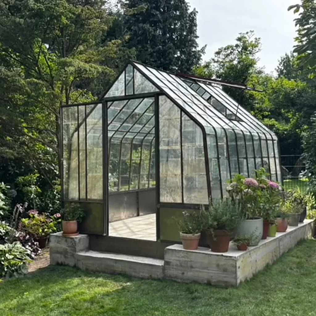 metal and glass garden house