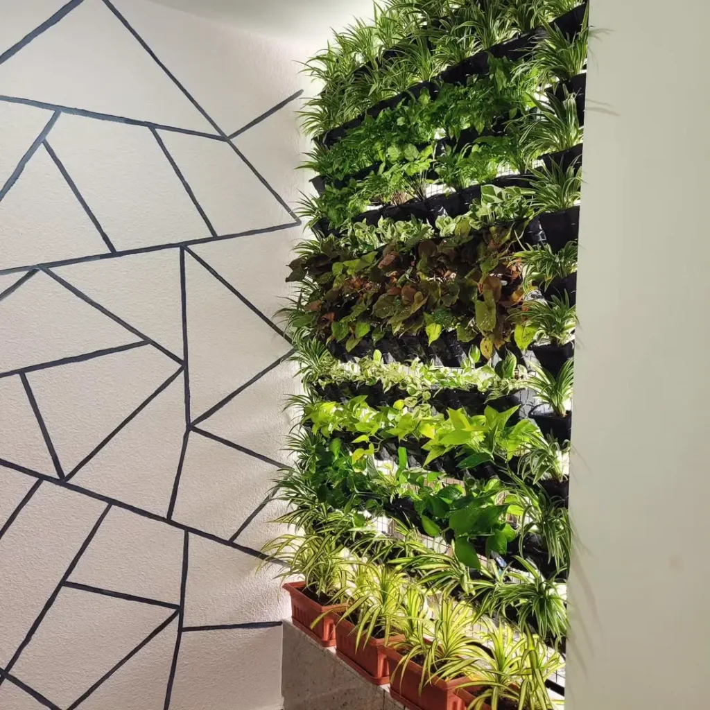 Indoor Wall Garden Ideas: Transform Your Walls into Living Art golden pothos wall garden